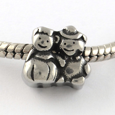 Two teddy bears made of surgical steel