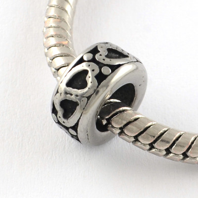 Bead extension with surgical steel hearts