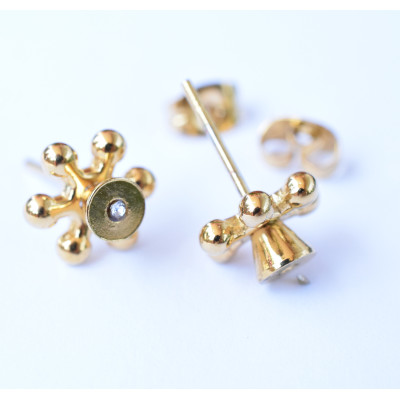 Flower buds of surgical steel and gold plating