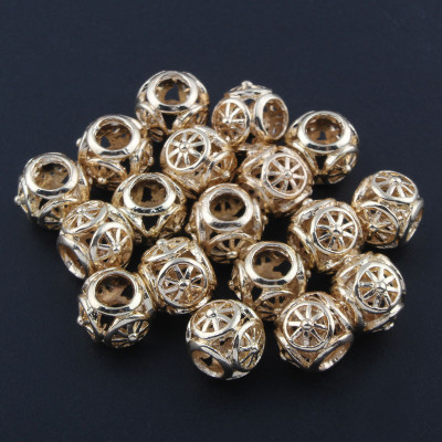 Bead with a large die-cut cut ornament from surgical steel