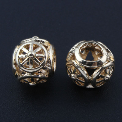 Bead with a large die-cut cut ornament from surgical steel