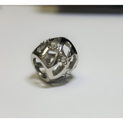 Cut bead with glued crystal color surgical steel