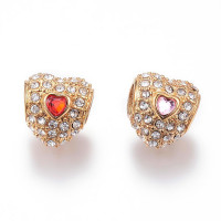  Heart-shaped bead with colored stone in the middle of surgical steel and gold plating 