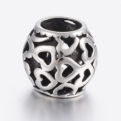 Larger pruned bead with surgical steel hearts