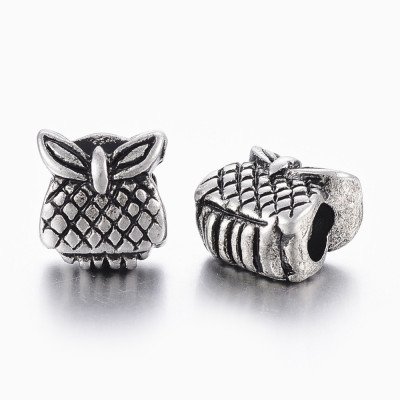 Surgical steel owl bead