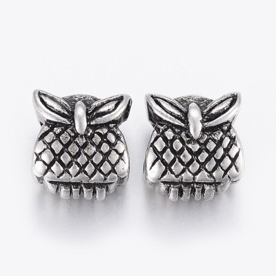 Surgical steel owl bead