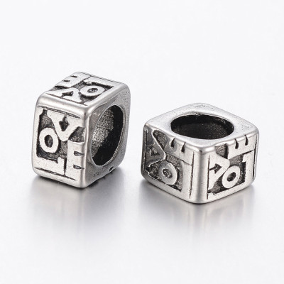 Bead cube with inscription Love made of surgical steel