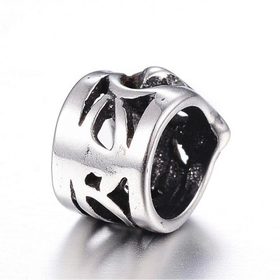 Small bead pruned with surgical steel ornament