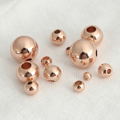 Rose Gold 1,5 x 2mm galvanized bead from surgical steel