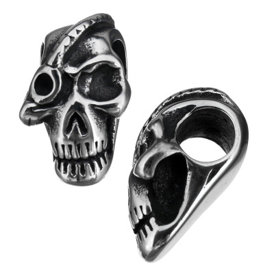 Skull with surgical steel eye tape