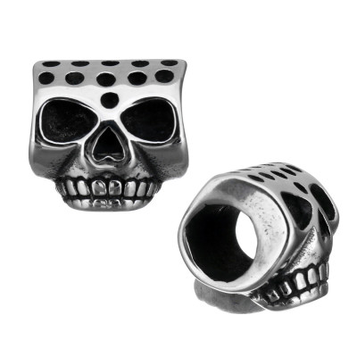 Skull in the shape of a roller made of surgical steel