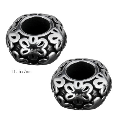 Bead with flowers in antique silver patina of surgical steel