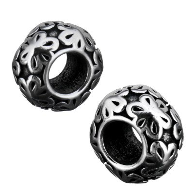 Bead with flowers in antique silver patina of surgical steel
