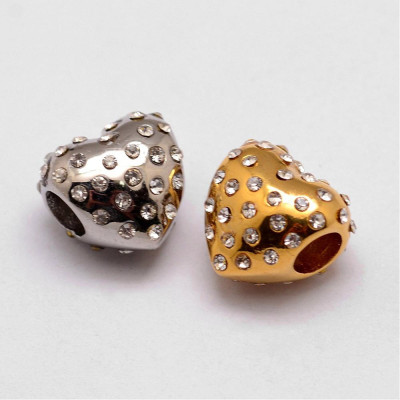Heart bead with rhinestones in two color variants of surgical steel