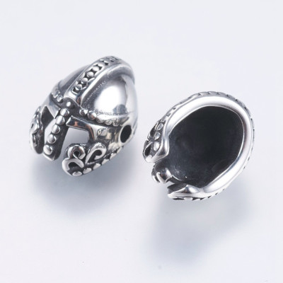 Bead knight's helmet decorated with surgical steel ornament