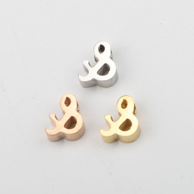 Ampersand Bead in three color combinations of surgical steel