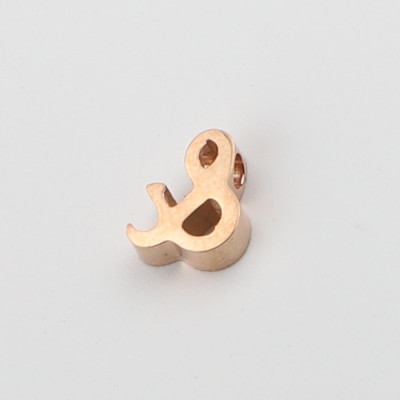 Ampersand Bead in three color combinations of surgical steel