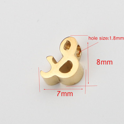 Ampersand Bead in three color combinations of surgical steel