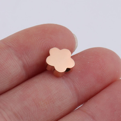 Bead flower in three color combinations of surgical steel