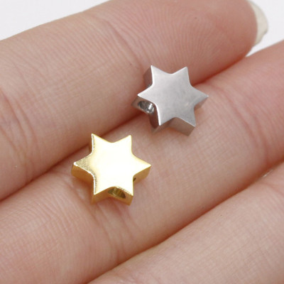 Star bead in two color combinations of surgical steel
