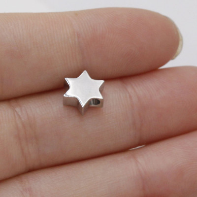 Star bead in two color combinations of surgical steel
