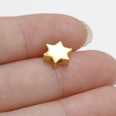 Star bead in two color combinations of surgical steel