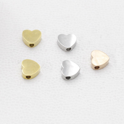 Heart bead in three color combinations of surgical steel horizontal hole