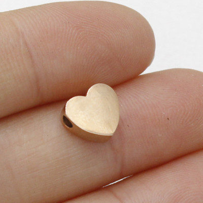 Heart bead in three color combinations of surgical steel horizontal hole