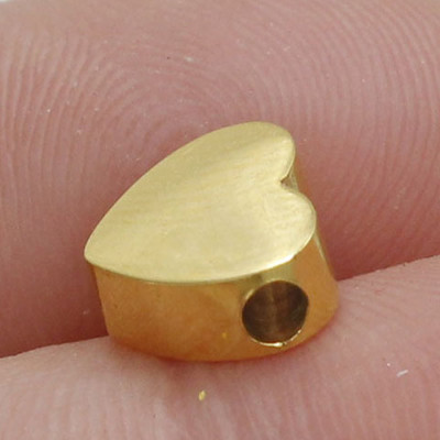 Heart bead in three color combinations of surgical steel horizontal hole