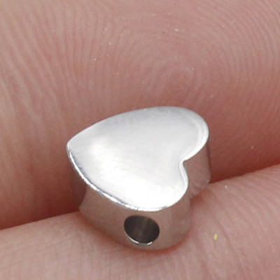 Heart bead in three color combinations of surgical steel horizontal hole