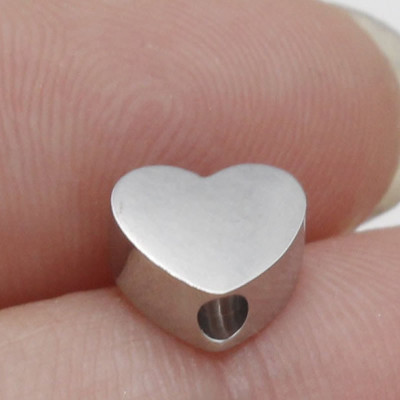 Heart bead in three color combinations of surgical steel vertical hole