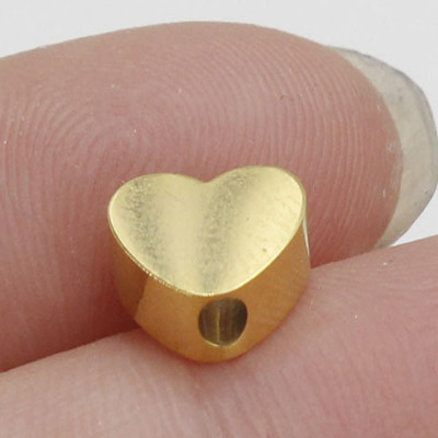 Heart bead in three color combinations of surgical steel vertical hole