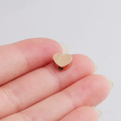 Heart bead in three color combinations of surgical steel vertical hole