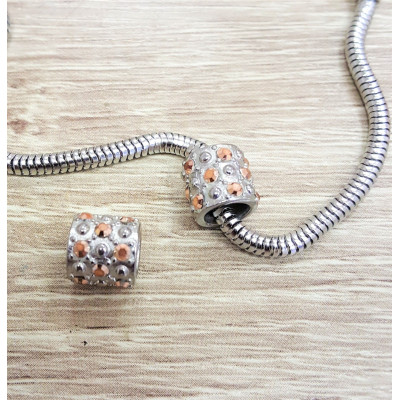 Surgical steel bead roller with Capri gold rhinestones