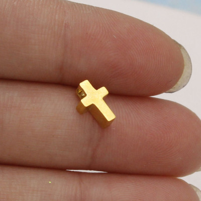 Small cross in three color variants made of surgical steel