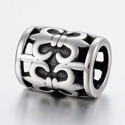 Cut tube with surgical steel ornament