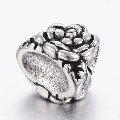 Triangle shaped bead with surgical steel ornaments