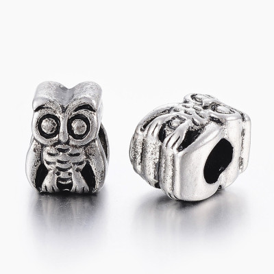Surgical steel owl bead