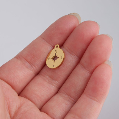 Surgical steel compass pendant in two color variants