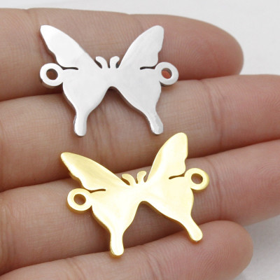 Bow tie connector in two color variants of surgical steel