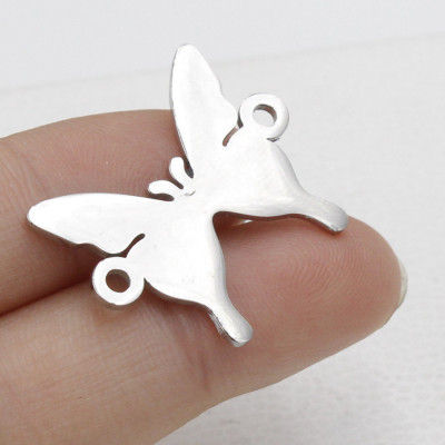 Konektor motýlek ve dvou barevných variantách z chirurgické oceli