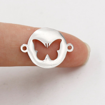 Bow tie connector in two color variants of surgical steel