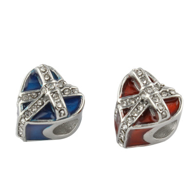 Red heart tied with a chaton ribbon made of surgical steel