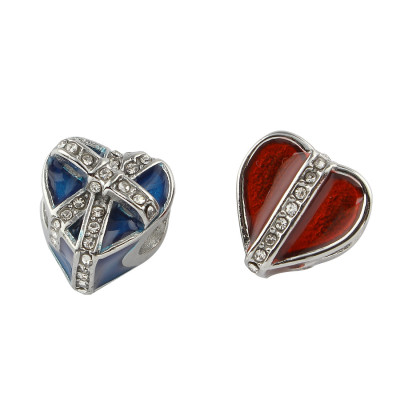 Red heart tied with a chaton ribbon made of surgical steel