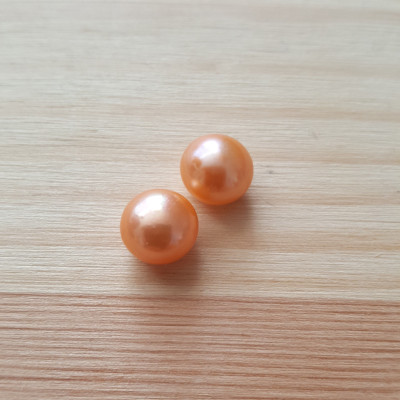 Perla sladkovodní sytě oranžová 7-7,5mm polovrtaná