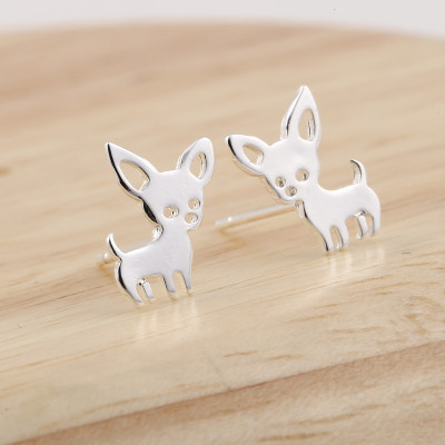 Dog earrings in four colors made of surgical steel