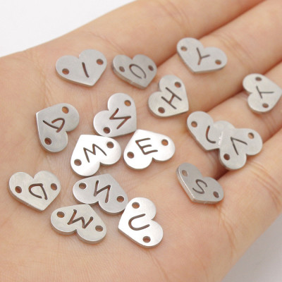 Heart shape connector with surgical steel letter
