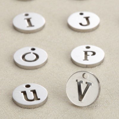 Pendant letters of the alphabet made of surgical steel