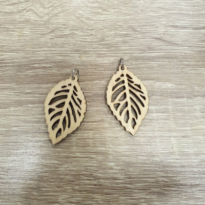 Carved leaf with a steel ring