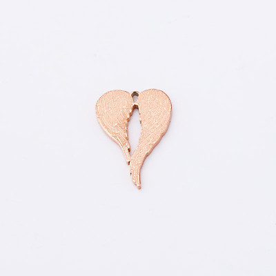 Heart pendant with wings in three color combinations made of surgical steel